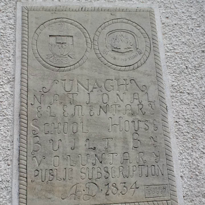 Image of copy of an original date stone  placed on the schoolhouse at 19 Lough Fea Rd. Photo John Cotton.