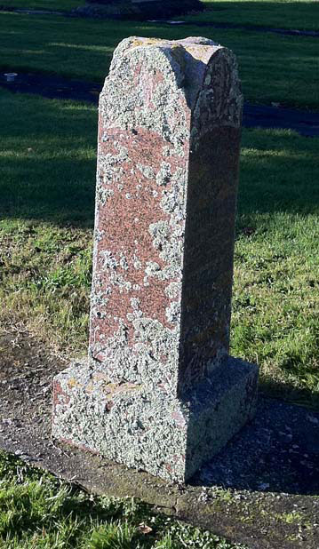 Image of Mary’s grave with encrusting lichen.